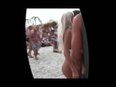 Beautiful girls with exquisite painted bodies in nude beach